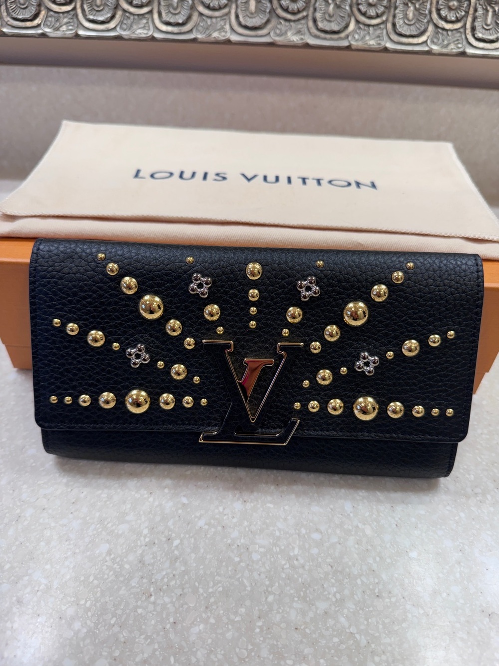 Louis Vuitton Black Grained Leather Studded Flap Wallet with Gold Accents